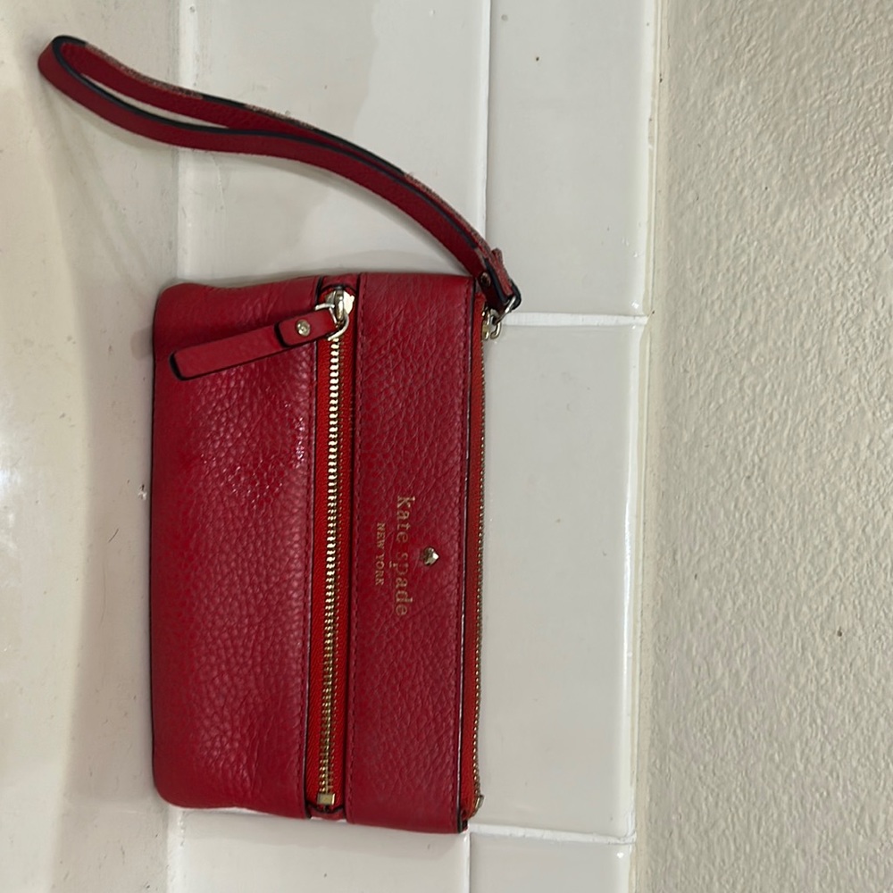 Kate Spade wristlet red color with handle damages zipper intact
